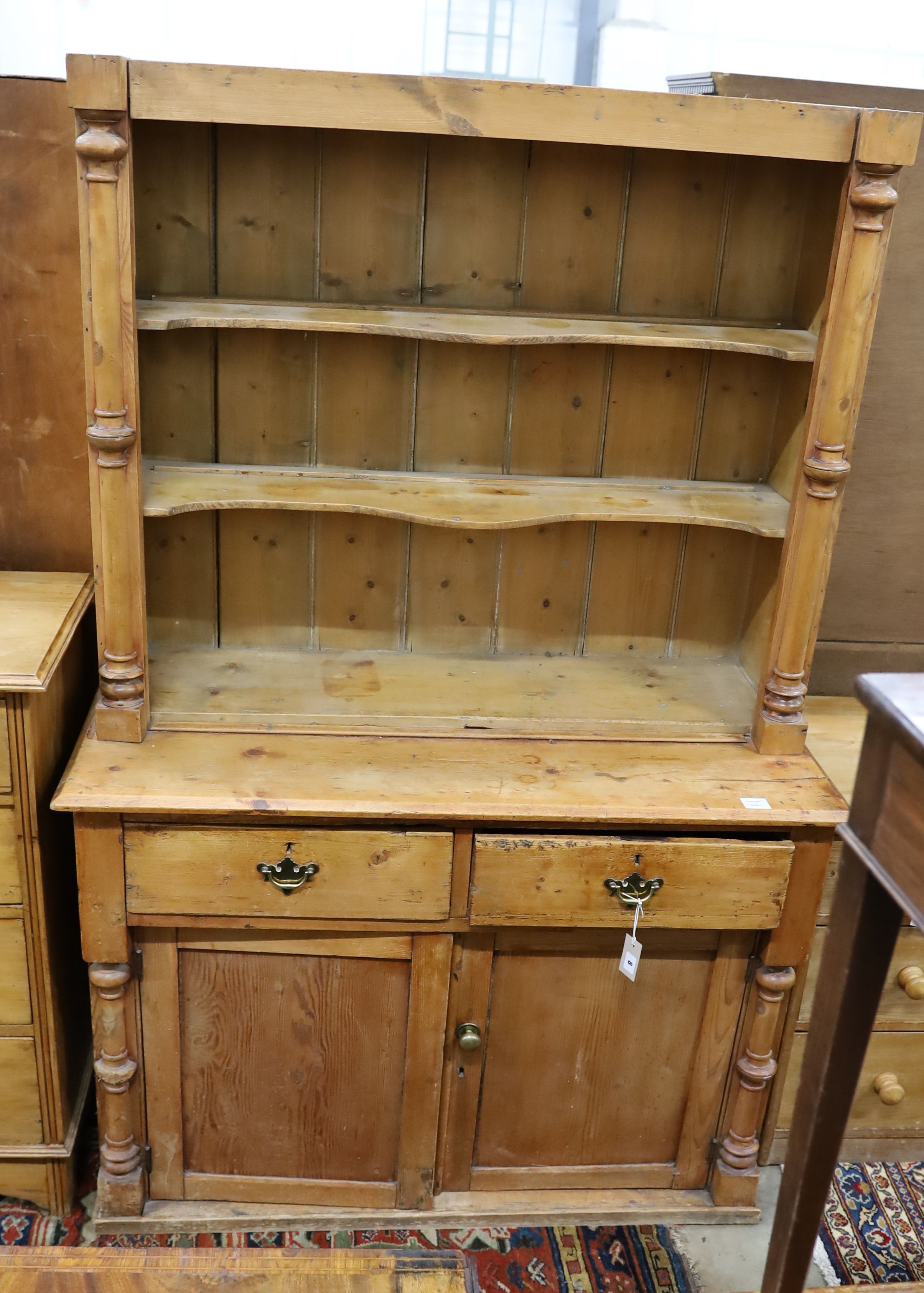 A Victorian pine dresser, and rack, length 120cm, depth 52cm, height 187cm